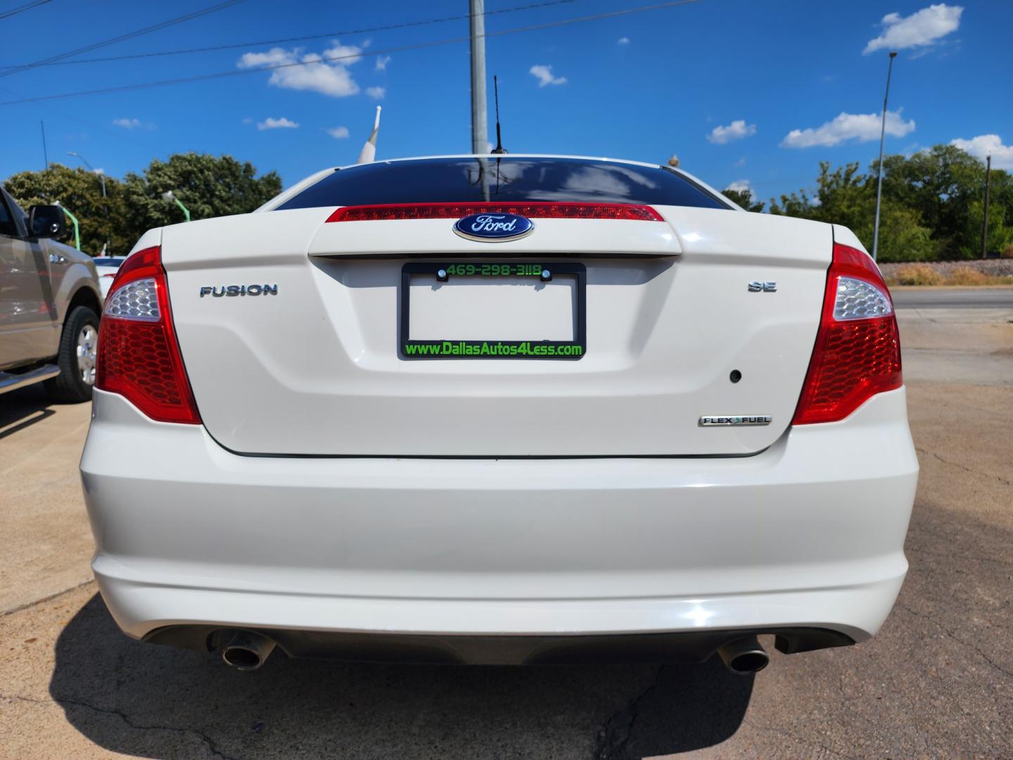 2012 WHITE Ford Fusion se (3FAHP0HG8CR) , AUTO transmission, located at 2660 S.Garland Avenue, Garland, TX, 75041, (469) 298-3118, 32.885551, -96.655602 - Welcome to DallasAutos4Less, one of the Premier BUY HERE PAY HERE Dealers in the North Dallas Area. We specialize in financing to people with NO CREDIT or BAD CREDIT. We need proof of income, proof of residence, and a ID. Come buy your new car from us today!! This is a Super Clean 2012 FORD FUSIO - Photo#4